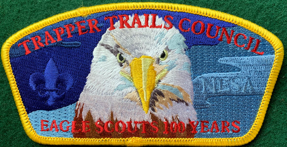 Trapper Trails Council Eagle Scouts '100 Years' Commerative Edition CSP SA-166:2. Ghosted 'NESA' and Bald Eagle Head Embroidered Detailing. Yellow Border. Mint Condition.