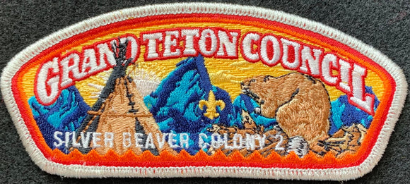 Grand Teton Council Silver Beaver Colony #2 Commerative CSP SA-303. Silver Mylar Border, Full Color Beaver, and Tepee Embroidered Details. Mint Condition.