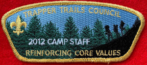 Trapper Trails Council 2012 Camp Staff Special Issue CSP SA-165. 'Reinforcing Core Values' Text Detail. Gold Mylar Border. Mint Condition.