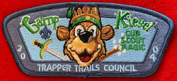 Trapper Trails Council 2004 Camp Kiesel Commerative Edition CSP SA-36. 'Cub Scout Magic' Embroidered Detailing. Steel Blue Border. Mint Condition.