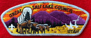 Great Salt Lake Council, Utah CSP SA-10. Embroidered Bull-Drawn Covered Wagon Infront of Dark Purple Mountainscape Details. Silver Mylar Border. Mint Condition.