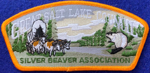 Great Salt Lake Council Silver Beaver Association Commerative CSP SA-119. Olive Green Wooded Background Embroidery. Yellow Border with Silver Mylar Embroidered "Medal" Detail. Mint Condition.