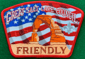 Great Salt Lake Council Friends of Scouting (FOS) CSP SA-126. Embroidered Large Full Color Canyon Range with 'Friendly' Detail and American Flag Background. Red Border. Mint Condition.