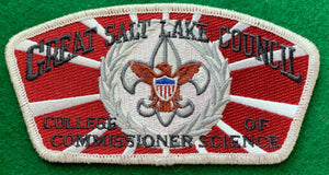 Great Salt Lake Council 'College of Commissioner Science' Edition CSP SA-146. Gray and Brown Scouting Fleur-de-lis within Silver Wreath Embroidered Details. Red/Silver Background. Silver Mylar Border. Mint Condition.