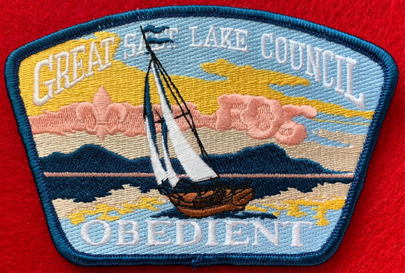 Great Salt Lake Council Friends of Scouting (FOS) Edition CSP SA-158:1. Embroidered Sailboat on Reflective Lake with 'Obedient' Detail. Steel Blue Border. Mint Condition.