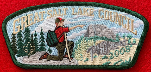 Great Salt Lake Council 2008 Philmont Trek Commerative CSP SA-170. Full Color Embroidered Pointing Scout on Wooded Hillside Background. Dark Green Border. Mint Condition.