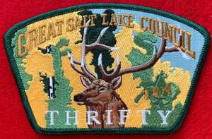 Great Salt Lake Council Friends of Scouting (FOS) Edition CSP SA-183. Embroidered Full Color Deer (Buck) Infront of Yellow and Green Wooded Background with 'Thrifty' Detail. Dark Green Border. Mint Condition.