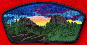 Great Salt Lake Council 2009 Philmont Trek Commerative CSP SA-186. Full Color Embroidered Wooded Landscape on Sunrise Background. Dark Blue Border. Mint Condition.