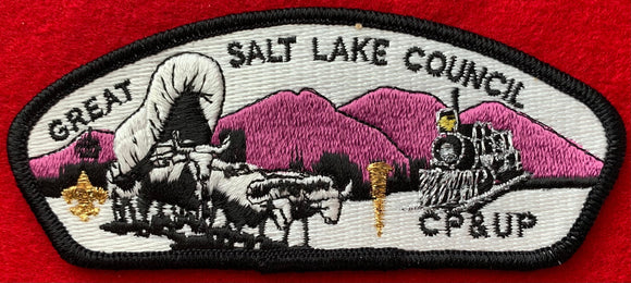 Great Salt Lake Council, Utah CSP SA-19. Embroidered Black and White Bull-Drawn Covered Wagon Infront of Light Purple Mountainscape and Silver Mylar Train Engine with Gold Mylar Railroad Spike Details. Mint Condition.