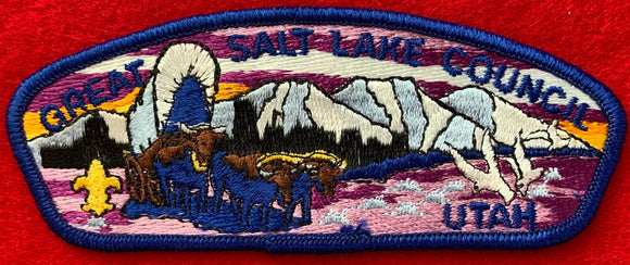 Great Salt Lake Council, Utah CSP SA-21. Embroidered Full-Color Bull-Drawn Covered Wagon Infront of Light Blue/White Mountainscape Detail. Dark Blue Border. Mint Condition.