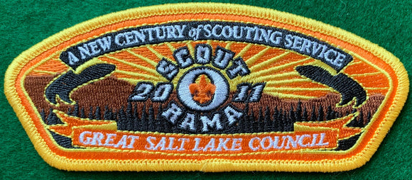 Great Salt Lake Council 2011 Scout-O-Rama Commerative CSP SA-221. Embroidered Yellow and Orange Sunrise over Wooded Foreground Detailing. 'A New Century of Scouting Service' Embroidered onto top of 