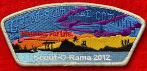 Great Salt Lake Council 2012 Scout-O-Rama Commerative CSP SA-239. Embroidered Yellow Orange, Purple, and Blue Sky Behind Scout Silhouette Details. 'Prepared. For Life' Embroidered over Background. Gray Border. Mint Condition.