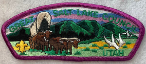 Great Salt Lake Council, Utah CSP SA-23. Embroidered Full-Color Bull-Drawn Covered Wagon Infront of Green Mountainscape Detail. Purple Border. Mint Condition.