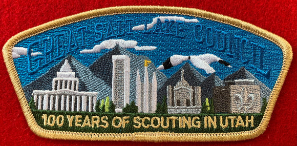 Great Salt Lake Council Centennial Celebration Commerative CSP SA-257. Salt Lake City-Scape Infront of Mountain Range Background Embroidery. Gold Mylar Border. Mint Condition.