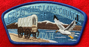 Great Salt Lake Council CSP SA-275. Embroidered Covered Wagon and Flying Seagull infront of Mountain Lake Landscape. Blue Border. Mint Condition.