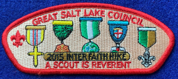 Great Salt Lake Council 2015 Interfaith Hike Commerative CSP SA-279. Various Embroidered Religious Medal Details. 'A Scout is Reverant' Text. Red Border. Mint Condition.