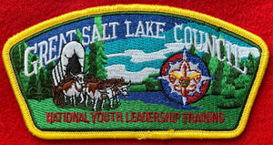 Great Salt Lake Council National Youth Leadership Training (NYLT) Commerative CSP SA-296. Embroidered Bull-Drawn Covered Wagon and NYLT Logo Details. Full Color Woodland Background. Yellow Border. Mint Condition.