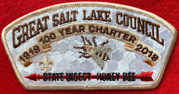 Great Salt Lake Council '100 Year Charter 1918-2018' Commerative Edition CSP SA-324. Embroidered Honey Bee on White Honeycomb Background. 'State Insect - Honey Bee' Text Embroidered over Red Arrow. Tan Border. Mint Condition.