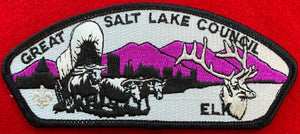 Great Salt Lake Council CSP SA-35. Embroidered Black-and-White Bull-Drawn Covered Wagon Infront of Dark Purple Mountainscape and Silver Mylar Elk Bust Details. Mint Condition.