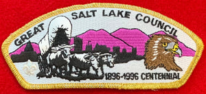 Great Salt Lake Council 1896-1996 Centennial Commerative CSP SA-37. Embroidered Black-and-White Bull-Drawn Covered Wagon Infront of Dark Purple Mountainscape and Golden Eagle Head Details. Gold Mylar Border. Mint Condition.