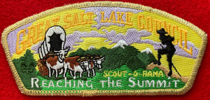 Great Salt Lake Council Scout-O-Rama Commerative CSP SA-63. "Reaching the Summit" Embroidery Detail Along with Embroidered Bull-Drawn Covered Wagon Beside Scout Silhouette. Gold Mylar Border. Mint Condition.