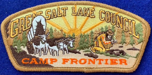 Great Salt Lake Council Camp Evergreen Commerative CSP SA-70. Brown/Olive Forested Background with Native American Starting Fire Embroidered Details. Mint Condition.