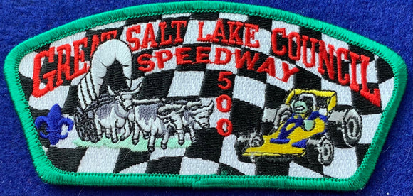 Great Salt Lake Council 'Speedway 500' Edition CSP SA-91. Embroidered Bull-Drawn Covered Wagon with Checkered Background and Racecar Details. Mint Condition.