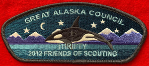 Great Alaska Council 2012 Friends of Scouting (FOS) Edition CSP SA-21:1. "Thrifty" and Orca Embroidered Details. Black Border. Mint Condition.