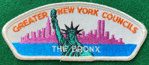 Greater New York Councils - The Bronx CSP T-1. Embroidered Statue of Liberty over New York City Skyline with Twin Towers Detailing. White Border. Mint Condition.