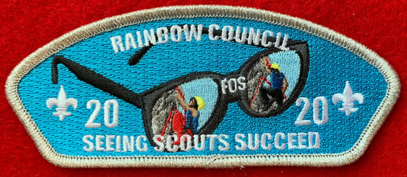 Rainbow Council 2020 Friends of Scouting (FOS) Commerative Edition CSP SA-74. 'Seeing Scouts Succeed' Text Details. Silver Mylar Border. Mint Condition.