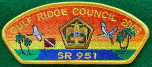 Gulf Ridge Council 2009 Wood Badge Commerative CSP SA-44. Embroidered Wood Badge Logo Superimposed on Coastal Background. Yellow Border. Mint Condition.