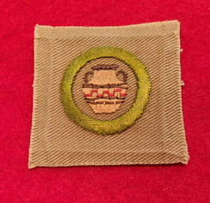 POTTERY FULL SQUARE MERIT BADGE, 1934-35, 52X53MM, USED-EXCELLENT COND., RARE!