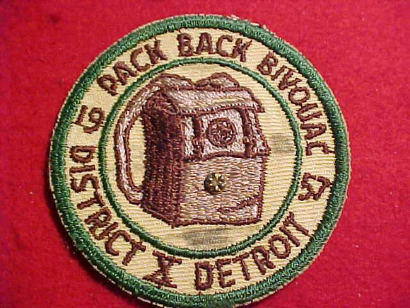 1957 DETROIT AREA C., DISTRICT 10, BACK PACK BIVOUAC, GOLD STUD ON BACKPACK, NO BUTTON LOOP
