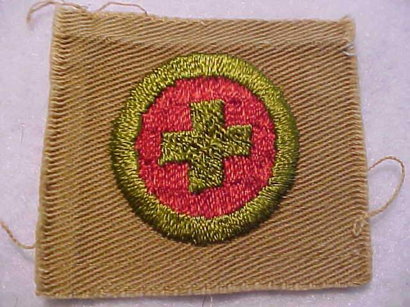 FIRST AID MERIT BADGE, SQUARE, 1920'S-1933, 47 X 53MM, USED