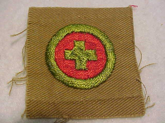 FIRST AID MERIT BADGE, SQUARE, 1920'S-1933, 55 X 51MM, USED