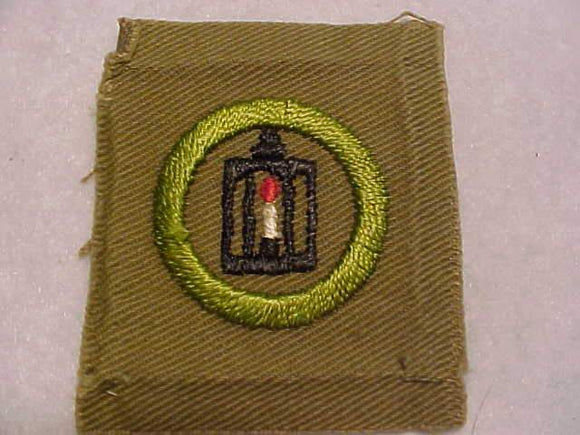 METALWORK MERIT BADGE, SQUARE, 1927-1933, 51 X 60MM, USED