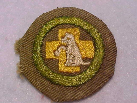 FIRST AID TO ANIMALS MERIT BADGE, WIDE BORDER CRIMPED, 1934-35, USED