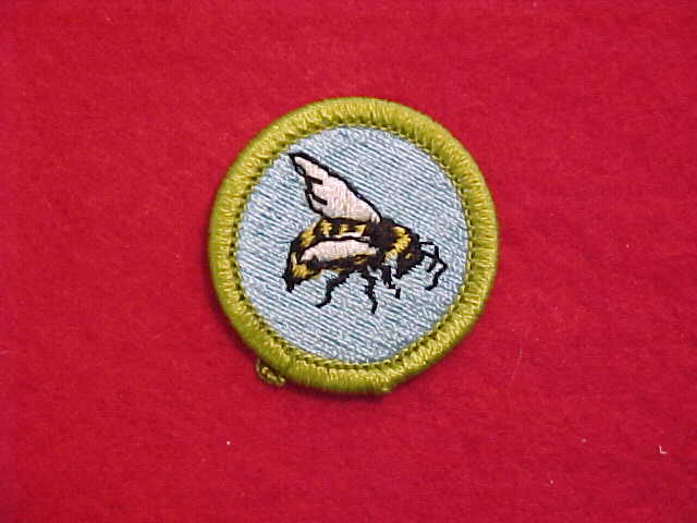 BEEKEEPING, MERIT BADGE WITH CLEAR PLASTIC BACK, GREEN BORDER, NO IMPR ...