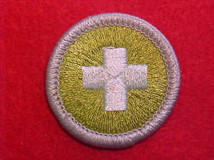 SAFETY, MERIT BADGE WITH PLASTIC BACK, SILVER BORDER, NO IMPRINTS/LOGOS IN PLASTIC