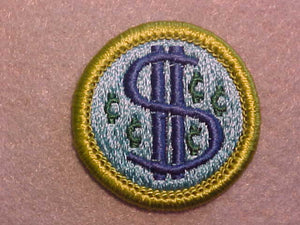 CONSUMER BUYING, MERIT BADGE WITH CLEAR PLASTIC BACK, GREEN BORDER, NO IMPRINTS/LOGOS IN PLASTIC