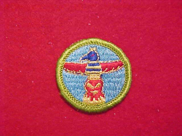 WOOD CARVING, MERIT BADGE WITH CLOTH BACK, GREEN BORDER, 1969-72