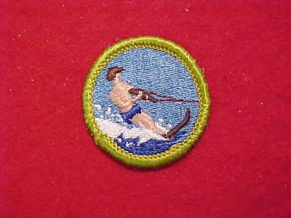 WATERSKIING, MERIT BADGE WITH CLOTH BACK, GREEN BORDER, 1969-72