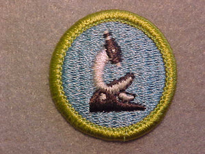 GENERAL SCIENCE, MERIT BADGE WITH CLEAR PLASTIC BACK, GREEN BORDER, NO IMPRINTS/LOGOS IN PLASTIC