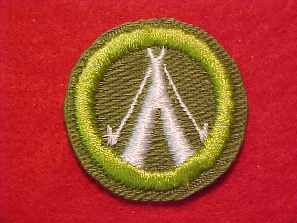CAMPING, MERIT BADGE WITH CRIMPED EDGE, KHAKI, ISSUED 1946-60