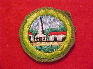 CITIZENSHIP IN THE COMMUNITY, MERIT BADGE WITH CRIMPED EDGE, KHAKI, ISSUED 1946-60