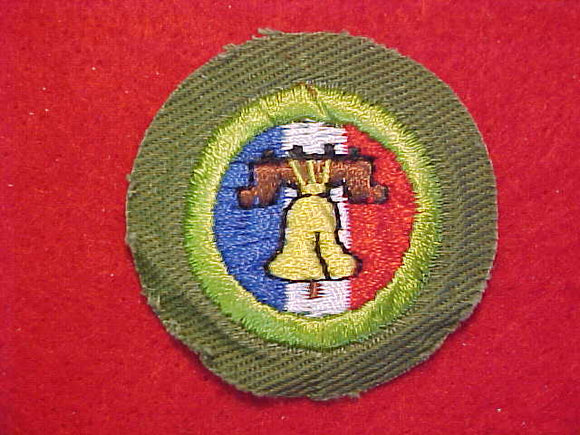 CITIZENSHIP IN THE NATION, MERIT BADGE WITH CRIMPED EDGE, KHAKI, ISSUED 1946-60