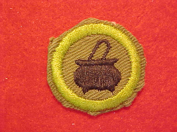 COOKING, MERIT BADGE WITH CRIMPED EDGE, KHAKI, ISSUED 1946-60