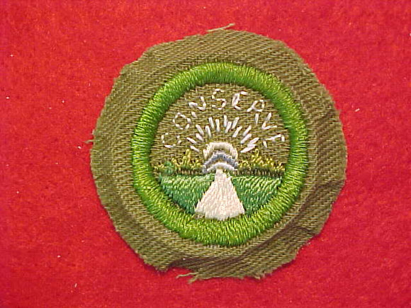 CONSERVATION, MERIT BADGE WITH CRIMPED EDGE, KHAKI, ISSUED 1946-60