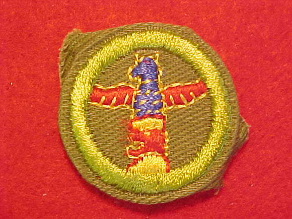 WOODCARVING, MERIT BADGE WITH CRIMPED EDGE, KHAKI, ISSUED 1946-60