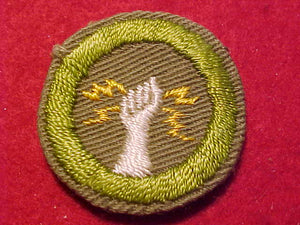 ELECTRICITY MERIT BADGE, CRIMPED EDGE, TAN, ISSUED 1936-45